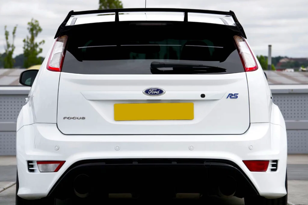 close up of white ford focus rear